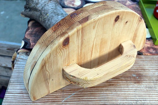 Zelfgemaakt houten dekseltje om de oven af te sluiten